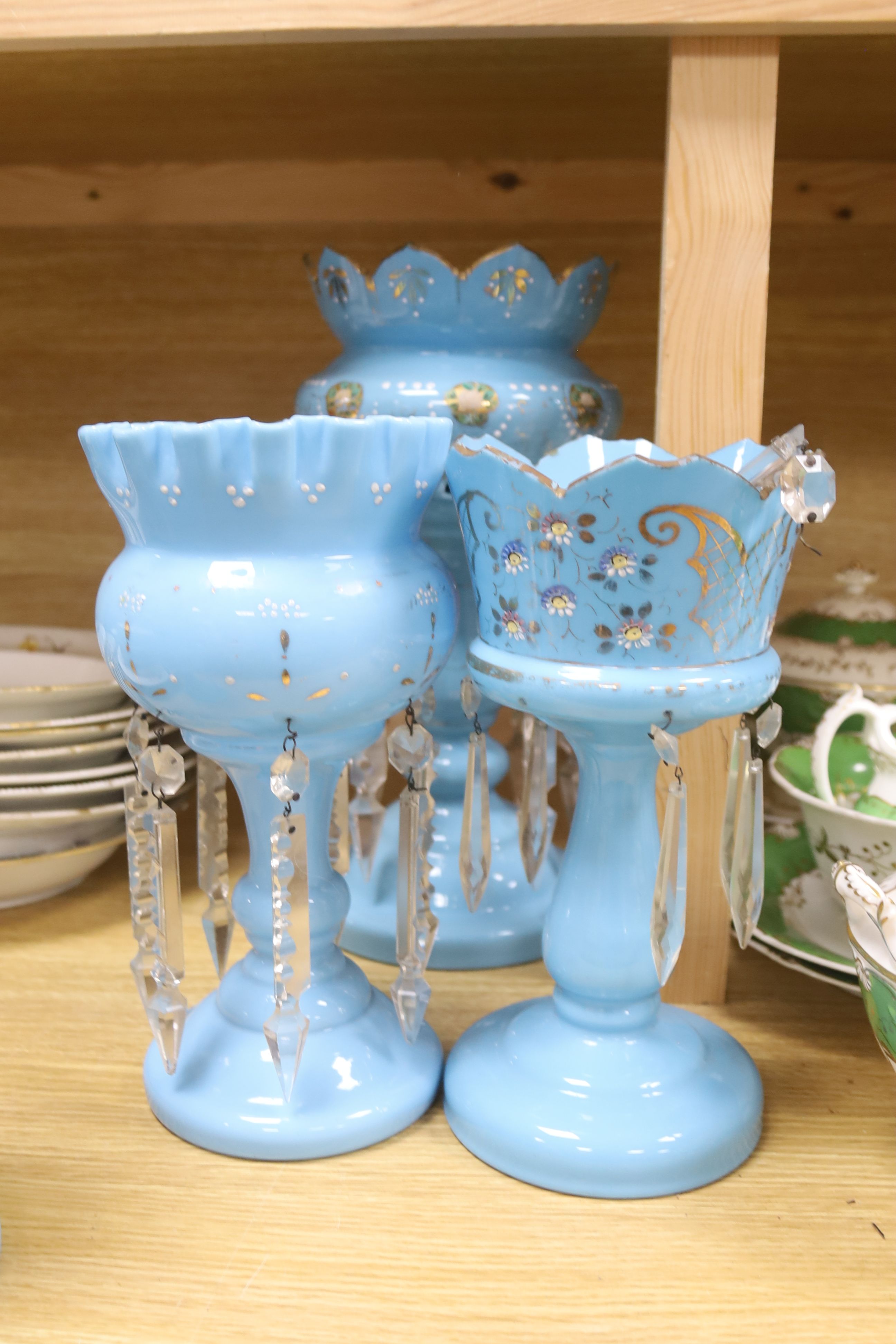 A matched set of five blue glass table lustres, 20th century, tallest 35cm